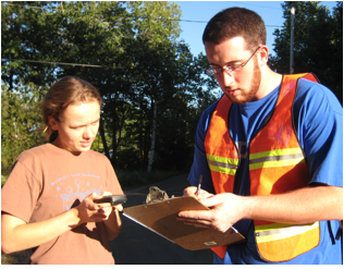 RoadSurvey9_15_08 011 data management, copying waypoints onto paper just in case, rob & hannah.jpg