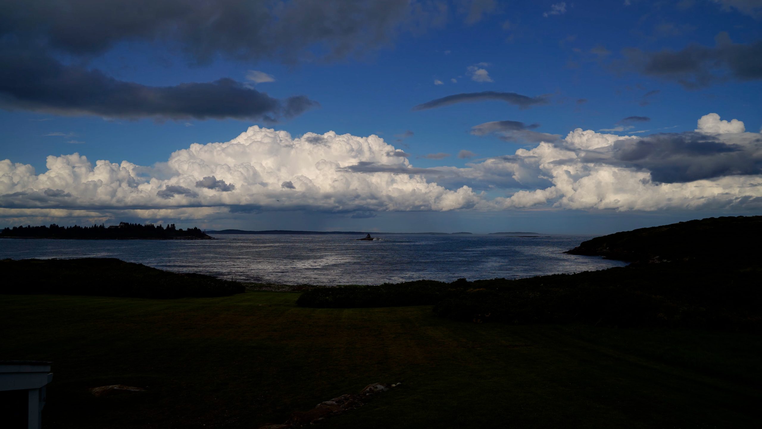 Dramatic clouds along Maine island coast
