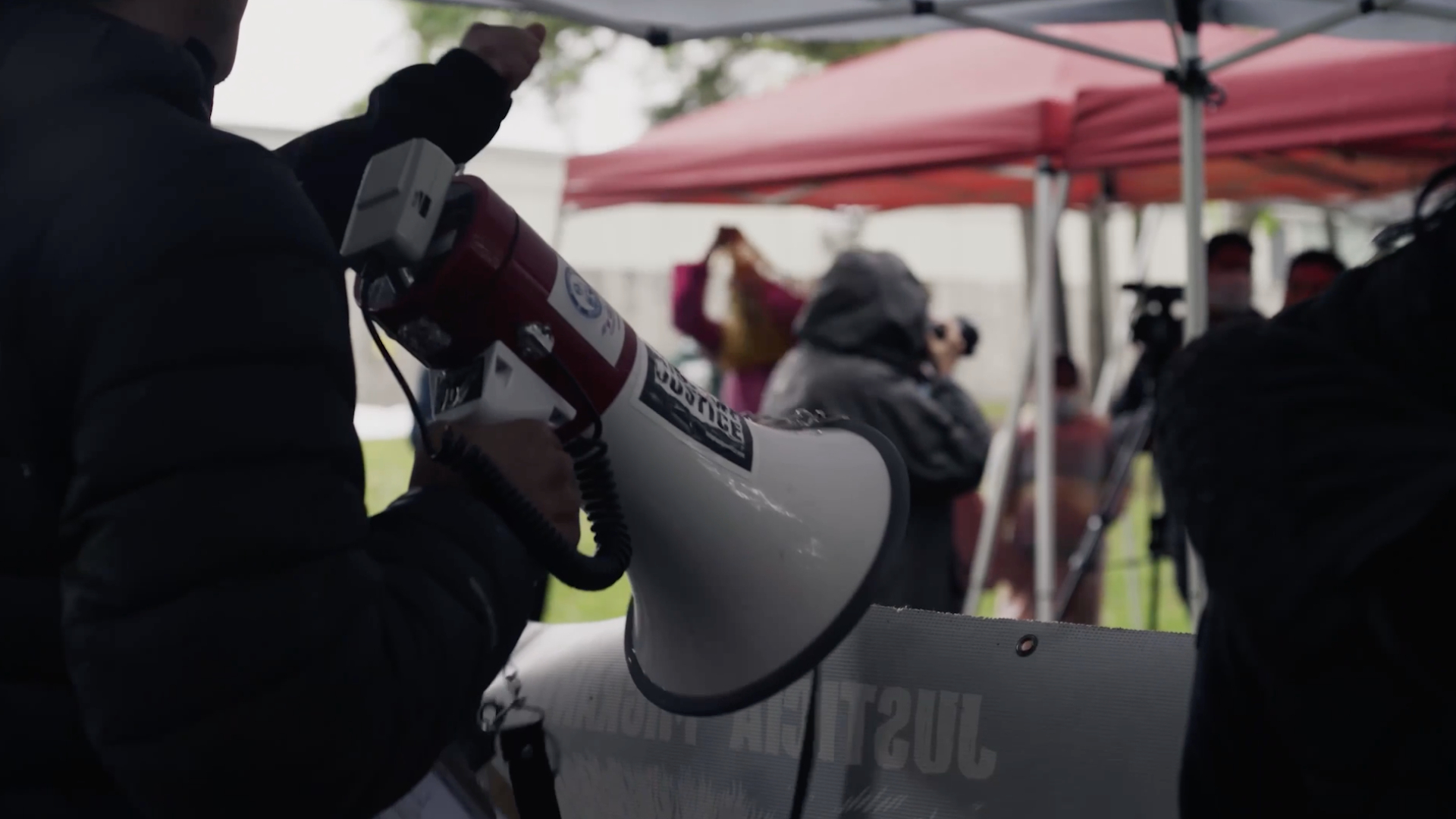 Person holding megaphone