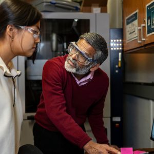 Student and professor in a lab