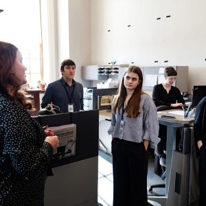 Maine Senate President Mattie Daughtry, left, chats with Gabrielle Lewis '28, a global studies and Spanish double major, and Lillian Ranco '26, a government major, at the Maine State House. The students were part of the Bram Public Policy Lab's new State House Fellows Program.