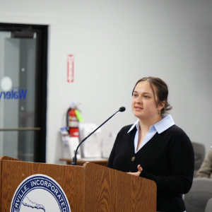 Woman at podium
